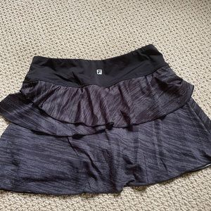 12 inch Fila tennis skirt. Black with white.